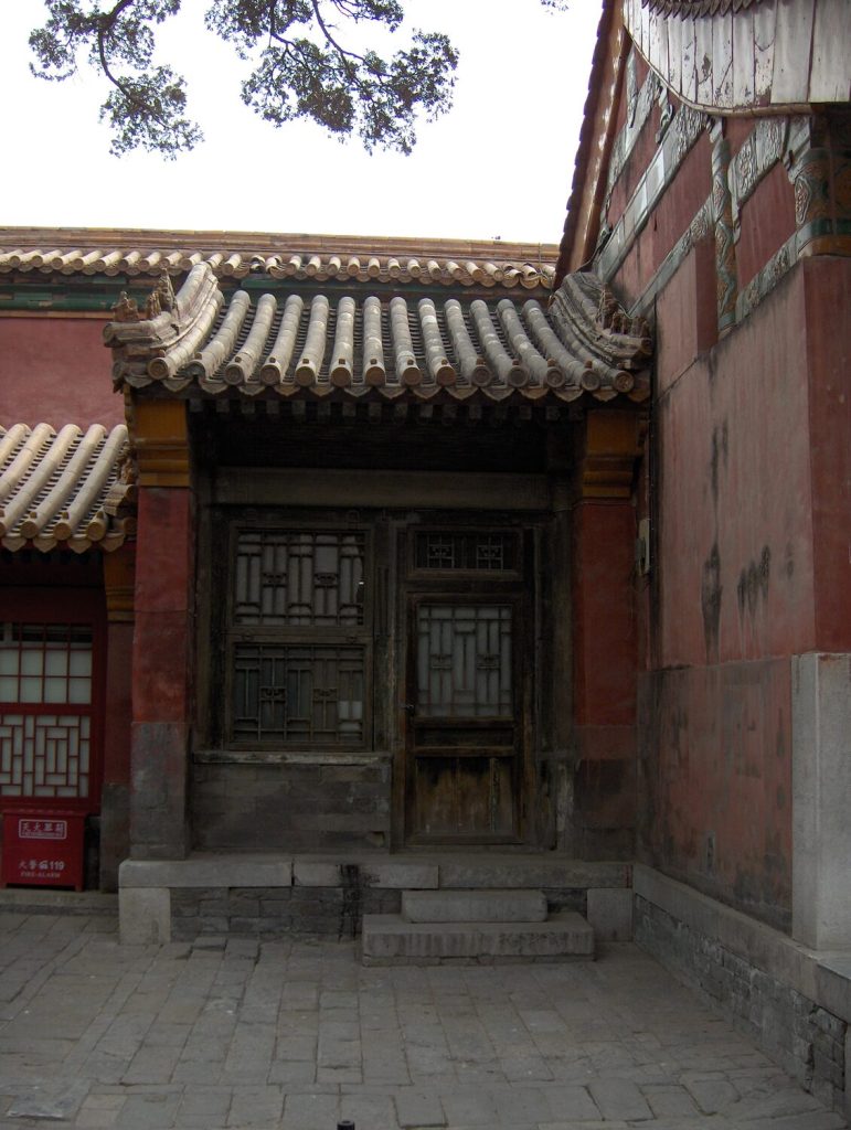 Minor garden building and red walls in the Imperial Garden