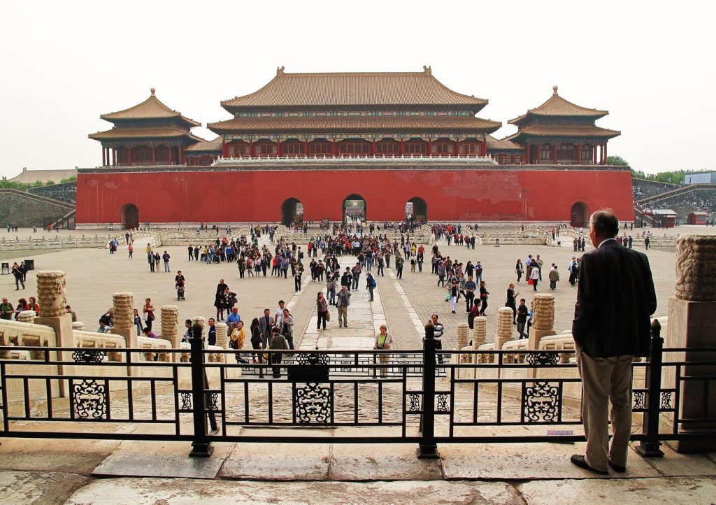 Main Forbidden City courtyard and gate approach where summer visitors concentrate