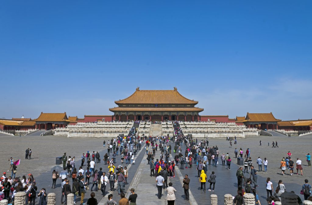 Visitors in front of the Hall of Supreme Harmony at the Forbidden City