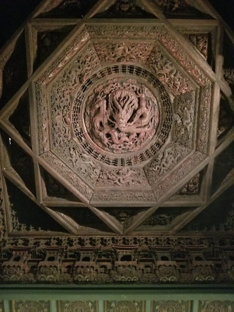 Carved octagonal decorated ceiling at Zhihua Temple in Beijing