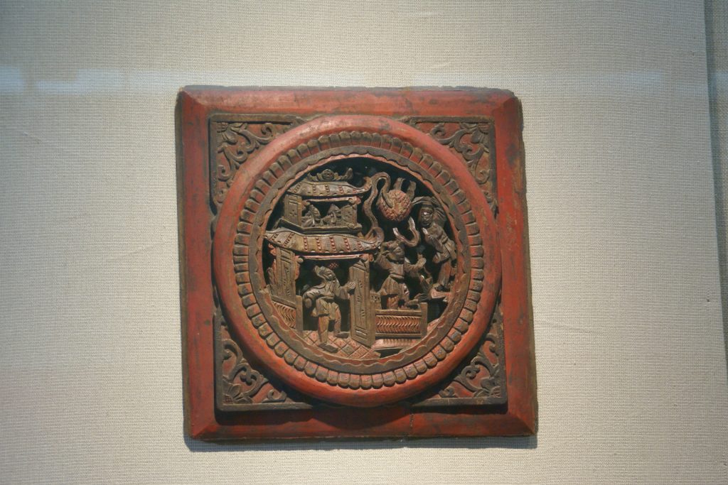 Carved historic object on display at Prince Gong Mansion