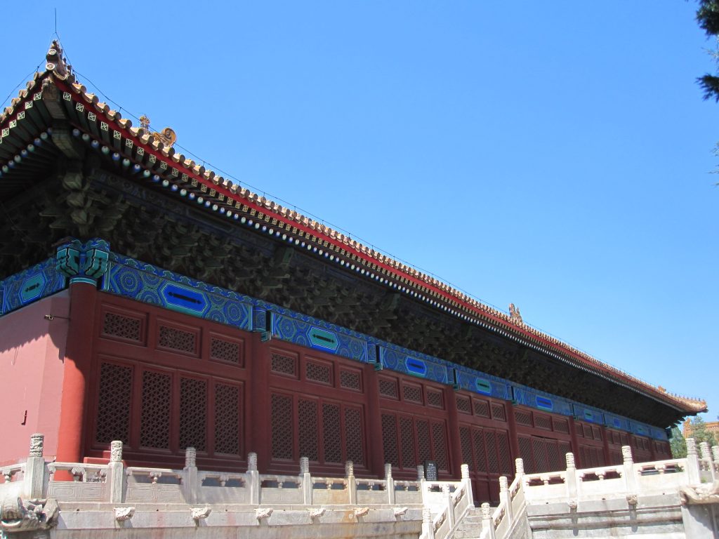 Decorated eaves and red wall at the Ancestral Shrine in Beijing Imperial Ancestral Temple