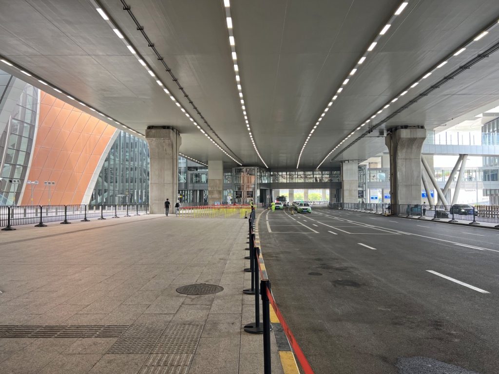 Roadway and terminal exit area at Beijing Daxing International Airport