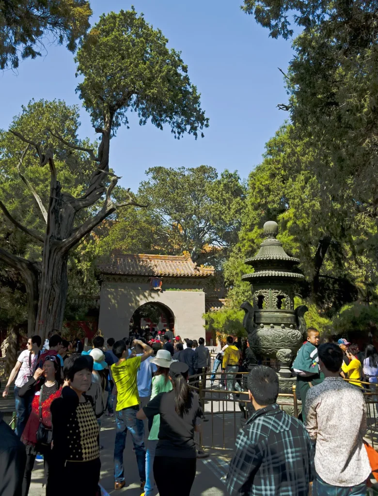 Dense visitor flow at a gate in the Forbidden City Imperial Garden